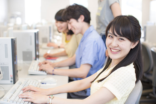 College Student Smiling in Computer Lab