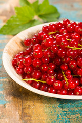 Fresh ripe red currant berries on the table