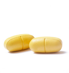 Yellow pills, studio shot
