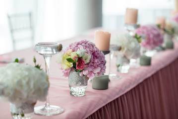 Wedding stylish decor elements in banquet hall closeup
