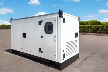 Industrial Diesel Generator. Standby generator. Industrial Diesel Generator for Office Building connected to the Control Panel with Cable Wire. Backup Generator Power. - obrazy, fototapety, plakaty