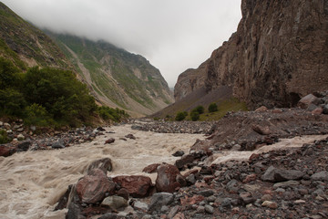 Russia, Republic of Kabardino-Balkaria, time lapse. Summer in the mountains of the Caucasus. Formation and movement of clouds over mountains peaks.