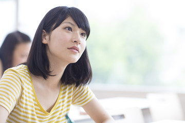 Female College Student in Classroom