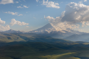 Russia, Republic of Kabardino-Balkaria, time lapse. Summer in the mountains of the Caucasus. Formation and movement of clouds over mountains peaks.
