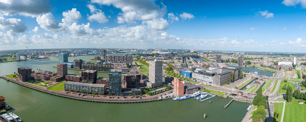 Aerial panoramic view of Rotterdam, The Netherlands, Holland. Rotterdam skyline with harbor. A...