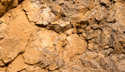 Stone cliffs in the mountains as a background