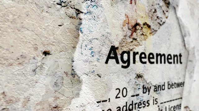 Agreement text on hole grunge concept