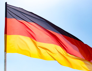Flag of Germany against the blue sky
