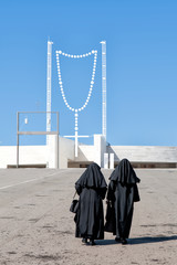 Catholic sisters walking in Fatima,  Portugal
