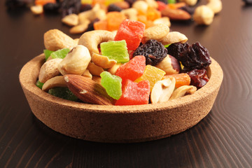 Dried fruits on a wooden background