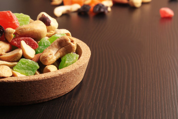 Dried fruits on a wooden background