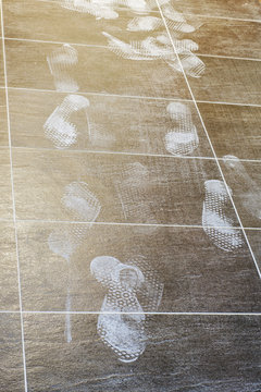 Foot Prints On The Tiled Floor, Construction Site