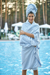 Model near swimming pool outdoors