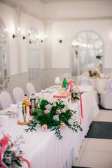 table set service with silverware and glass stemware at restaurant before party