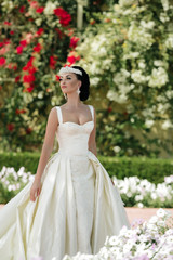 Girl or woman in dress and tiara in brunette hair