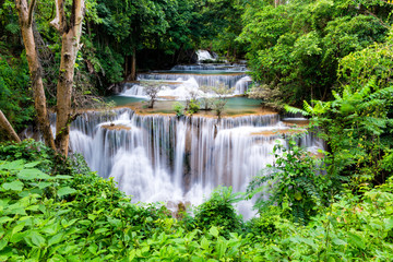 Naklejka na ściany i meble Beautiful waterfall in the national park forest at Huai Mae Khamin Waterfall, Kanchanaburi Thailand