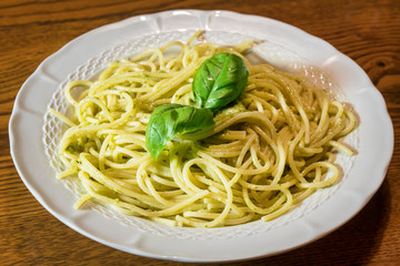 Spaghetti with pesto sauce.