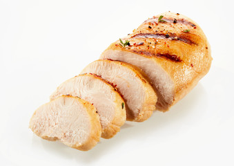 Grilled, sliced chicken breast with copy space