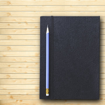 pencil with notebook