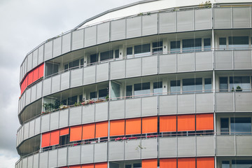 curved office building in vintage colors