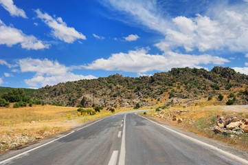 free and empty road, and mountains