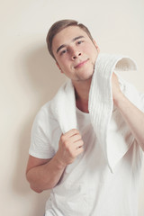 man is wiped off with a towel