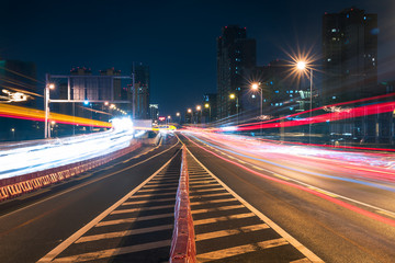 Fototapeta na wymiar Traffic at night on a chinese elevated highway, Chengdu, China