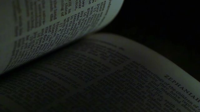 Flipping The Pages Of The Bible