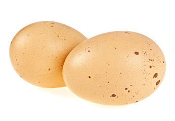 Fototapeta na wymiar Two eggs isolated on a white background