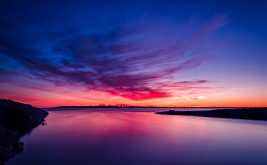 Fototapeta na wymiar Long exposure sunset. Very red and blue sky.