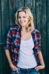 Fototapeta premium Country girl. Beautiful country woman outdoors. 