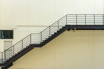 Papier Peint photo Escaliers escalier pour sortie de secours avec garde-corps en acier et échelle