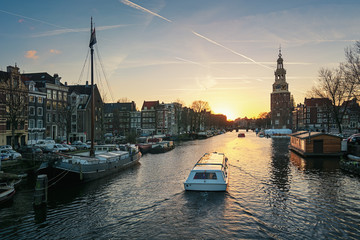 Сanal Oudeschans at sunset in the center of Amsterdam - obrazy, fototapety, plakaty