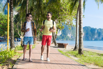 Two Man Using Cell Smart Phones Tropical Park Couple Chatting Online Holiday Sea Summer Vacation Ocean Travel
