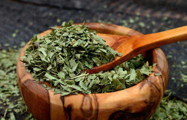 tarragon on wooden table