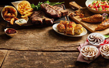 Set of grilled meat with side dishes