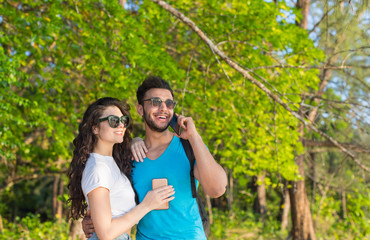 Couple Embracing Tropical Green Forest Summer Vacation, Beautiful Young People In Love, Man Woman Happy Smile Holiday Travel