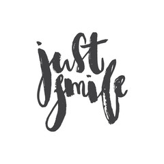 Obraz premium Just smile-handwritten phrase