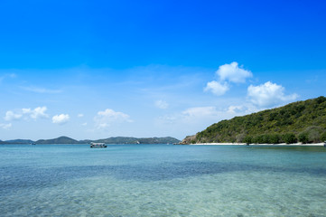 beautiful sea Kham Island rock beach is bright color and crystal clear water near Pattaya Sattaheep Chonburi Thailand