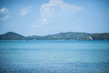 beautiful sea Kham Island rock beach is bright color and crystal clear water near Pattaya Sattaheep Chonburi Thailand