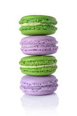 French dessert. Sweet green and purple macaroons or macarons
