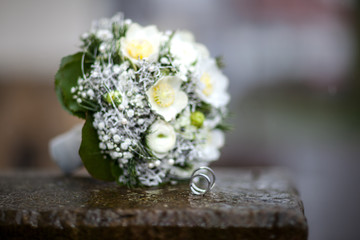 wedding rings and flowers