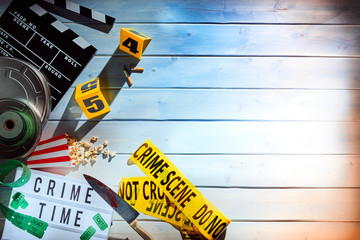 Overhead view of film and strips of yellow tape