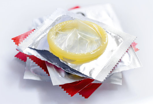 stack condoms isolated on white background.