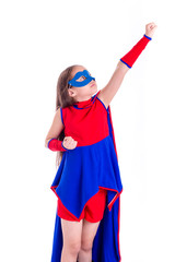 Young girl in superhero costume
