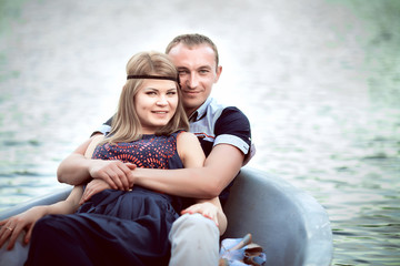 Fototapeta premium teenager lies in the boat