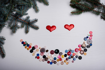 The white board with lots of buttons set out in a smile, Valenti