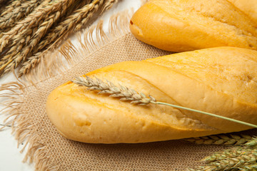 Freshly baked bread on wooden table