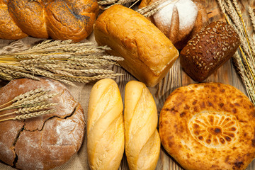 Bread assortment on background of the old canvas