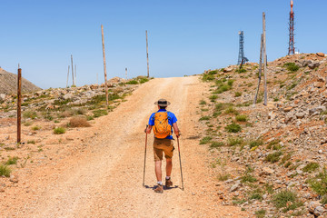 Man walking uphill